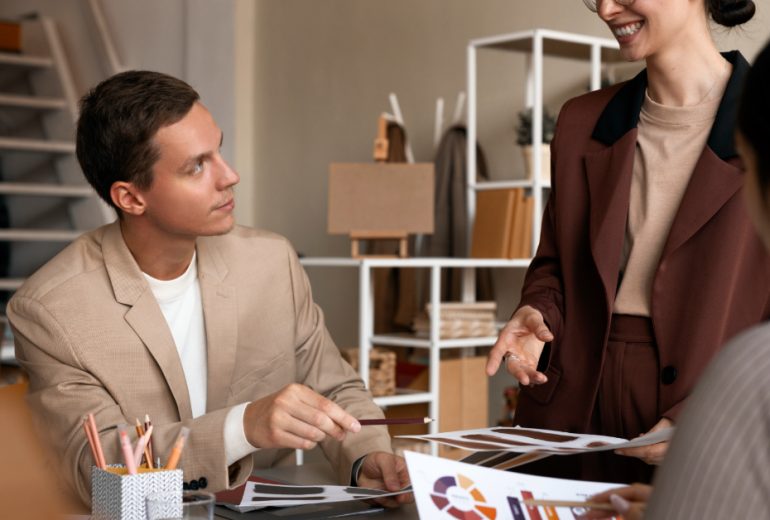 side-view-colleagues-working-as-team (1)
